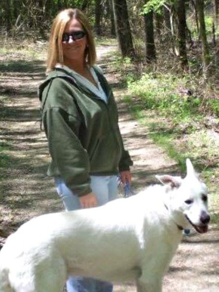 Collette and Caesar in the woods